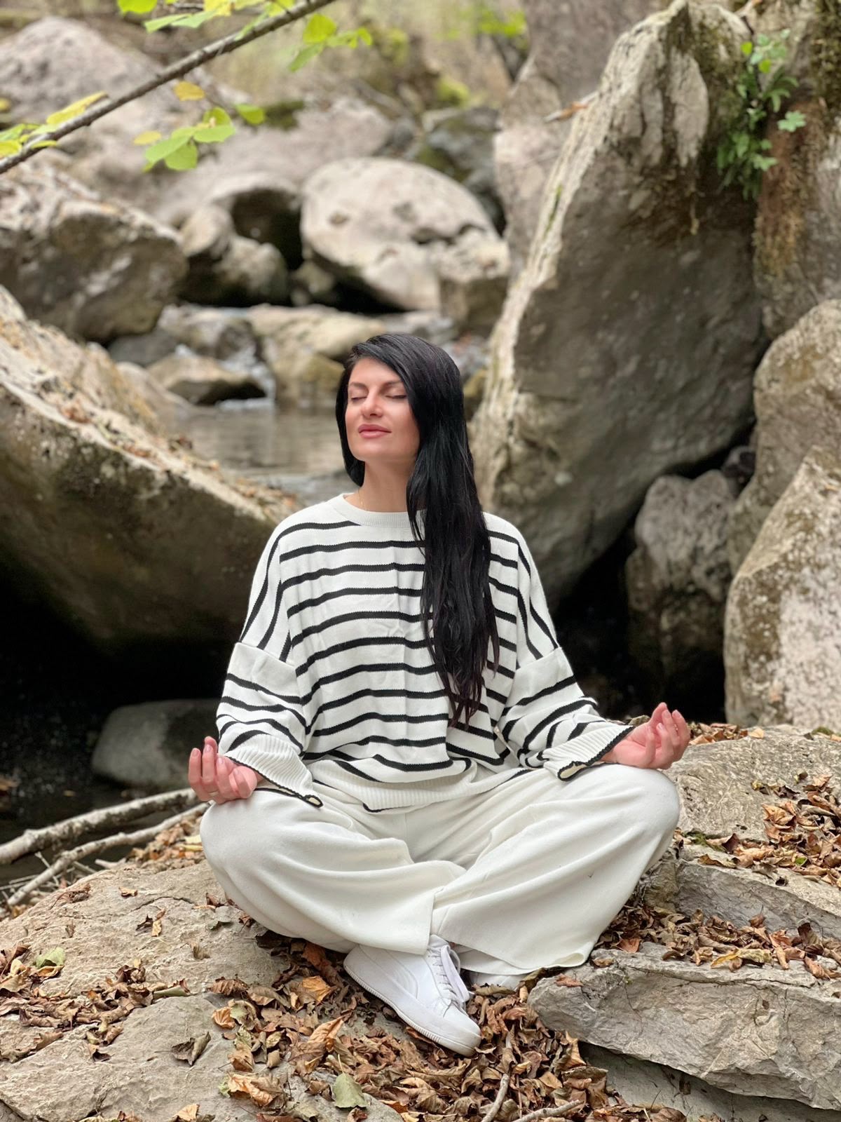 Lorena in meditation outdoors